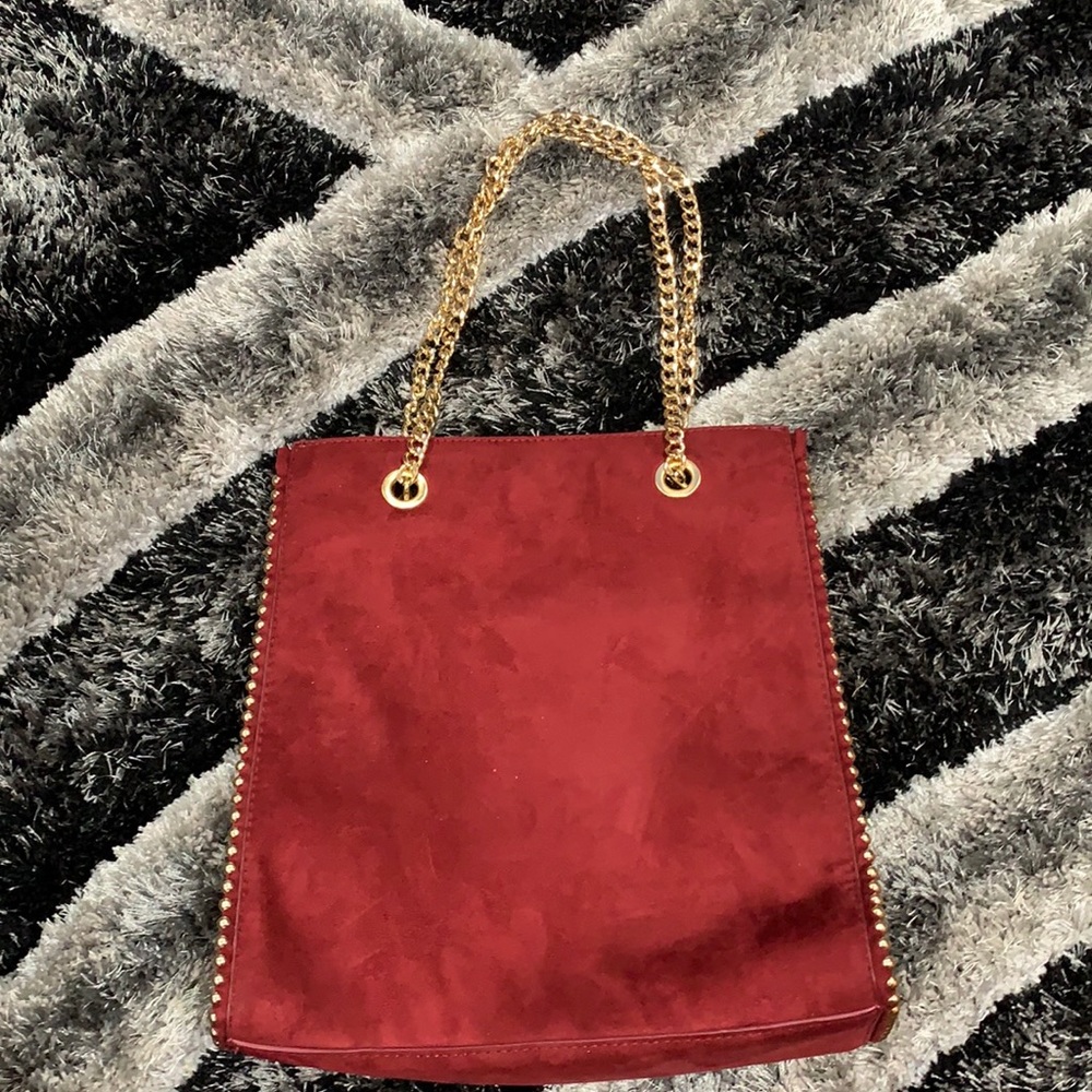 burgundy and gold suede purse